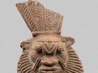 Aeg T 58  Aeg T 58, Römische Zeit, Beskopf, Roter Ton, H 5,2 cm, B 3,5 cm, T 1,9 cm : Bestandskatalog Ägypten, Museumsfoto: Claus Cordes
